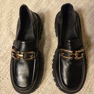 Elegant Black Loafers with Gold Accent